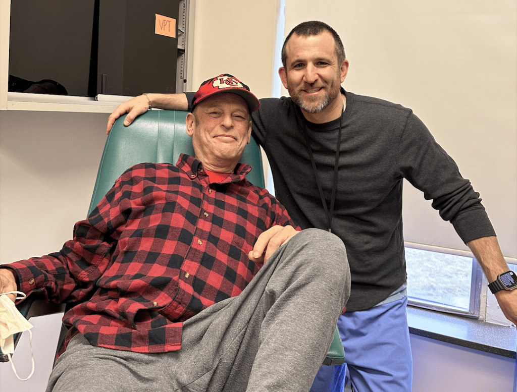 Photo of doctor and patient in a treatment room